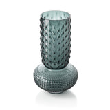 Textured glass vase on a white background