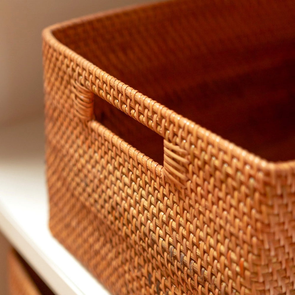 Close-up of a woven brown basket with a blurred background