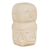 Stone sculpture of a face with triangular patterns on a white background