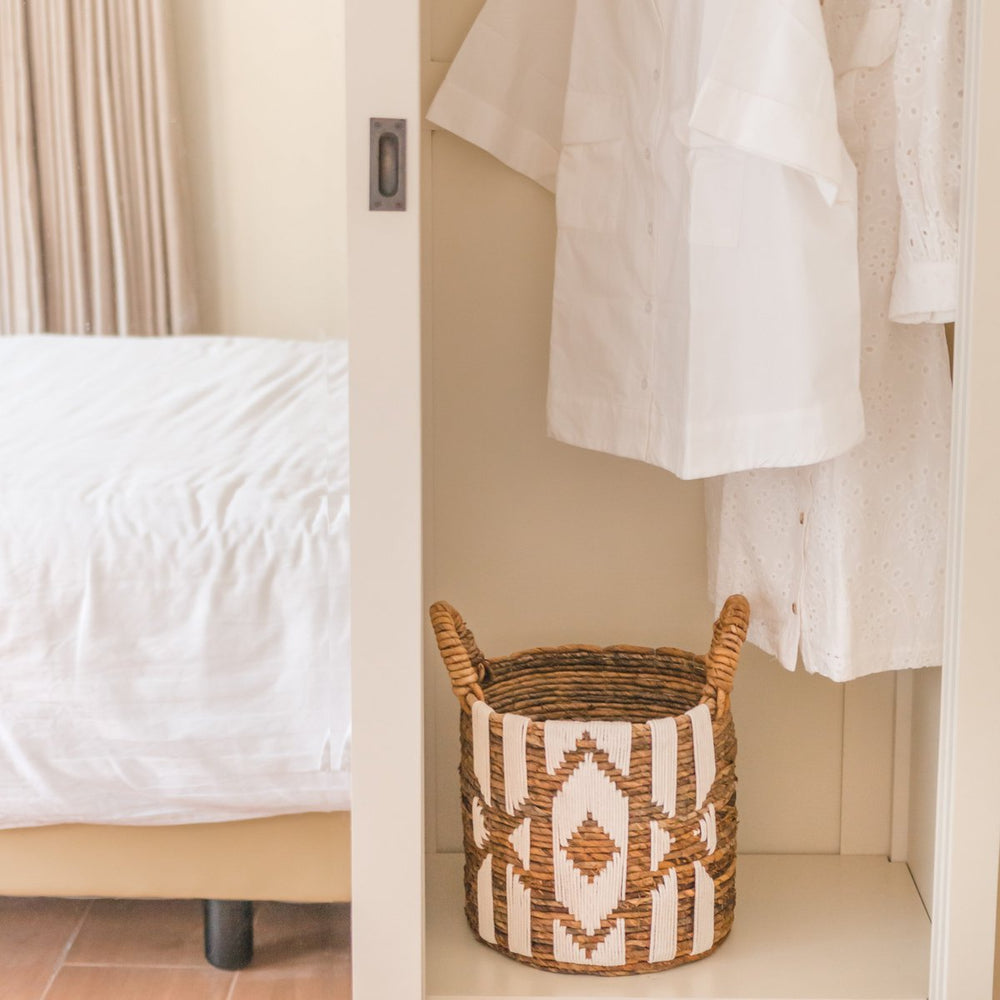 Brown banana fibre basket with white cotton macrame pattern