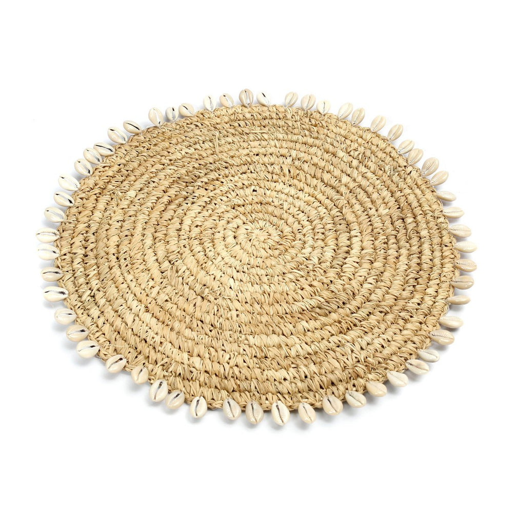 Natural raffia placemat with cowrie shells