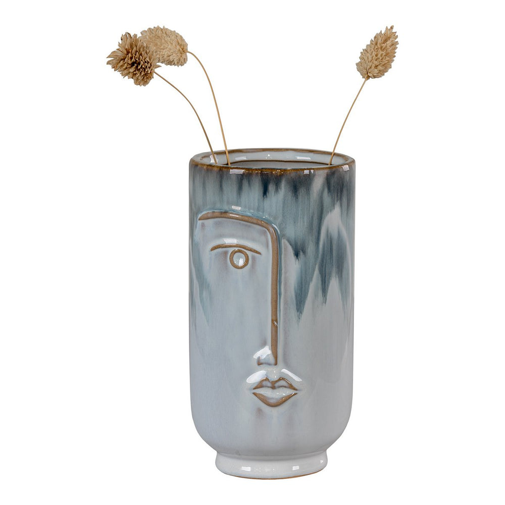 Blue porcelain vase with hand-painted face design