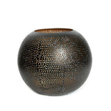 Black and gold pierced brass candle holder