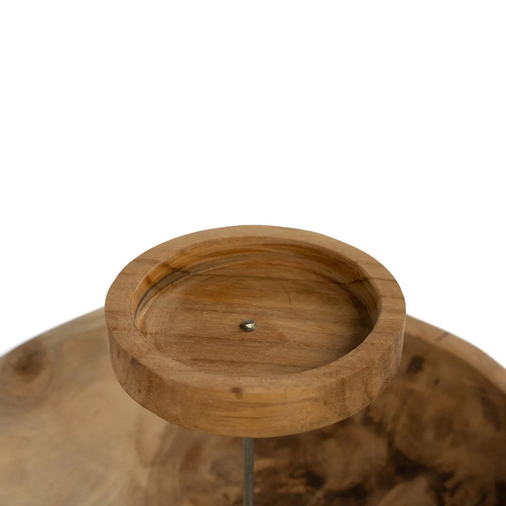 Wooden coaster with a central hole on a white background