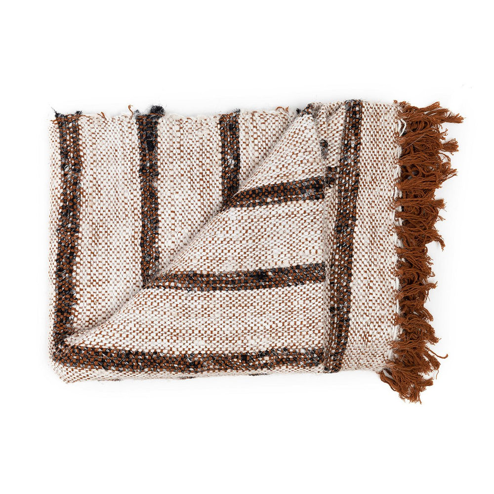 White fringed cotton throw with charcoal stripes and terracotta tassels
