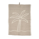 Natural white linen kitchen towel with palm tree print