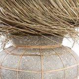Beige and grey terracotta table lamp with rattan grid and fringed grass shade