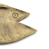Bronze fish-shaped platter on a white background