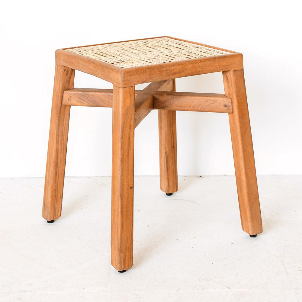 Brown wooden stool with woven rattan seat