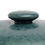 Teal-blue ceramic stew pot with lid