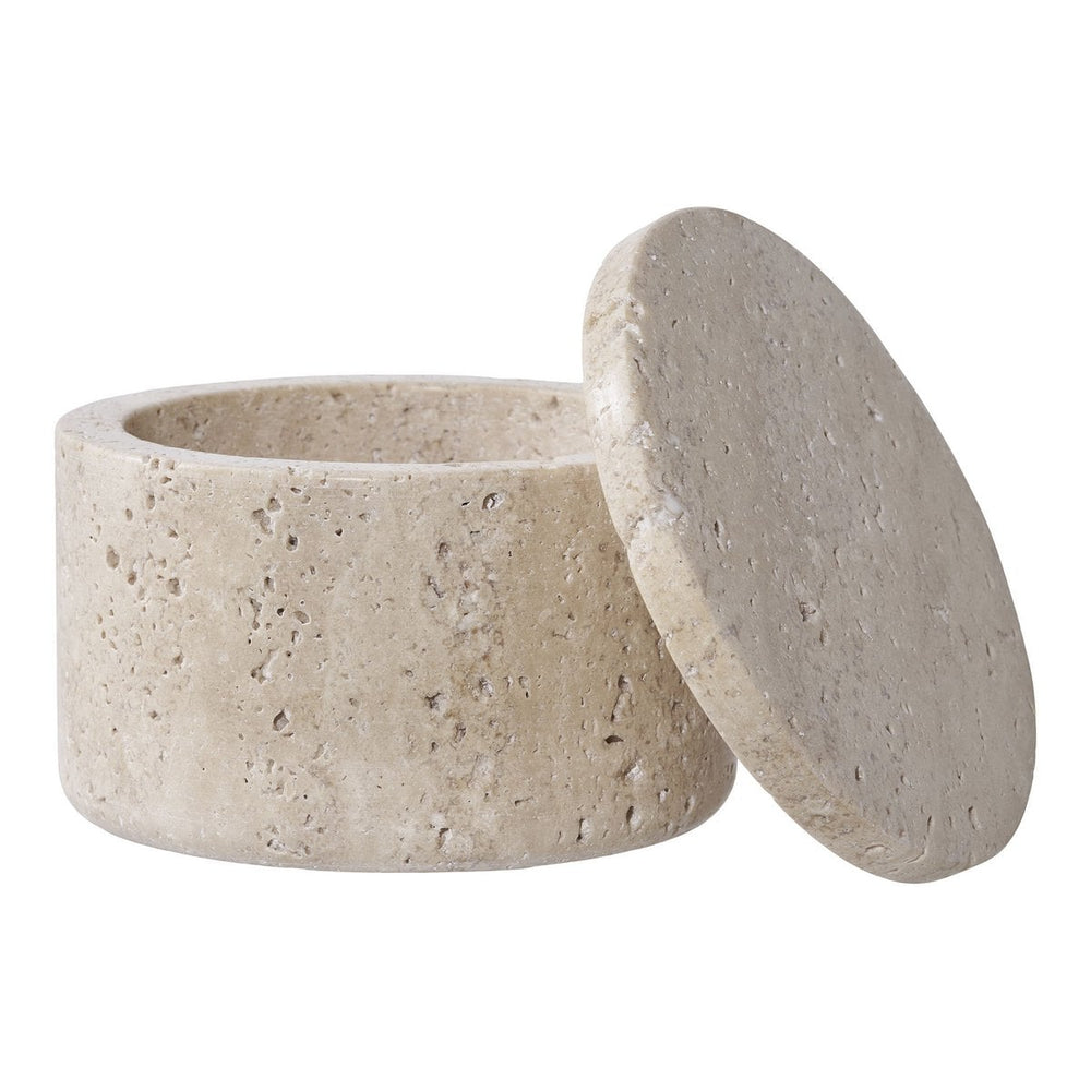 Beige stone container with lid on a white background