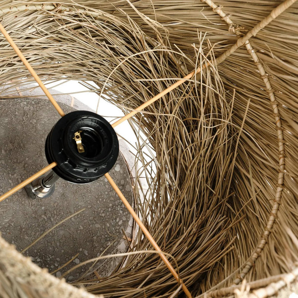 Beige and grey terracotta table lamp with rattan grid and fringed grass shade