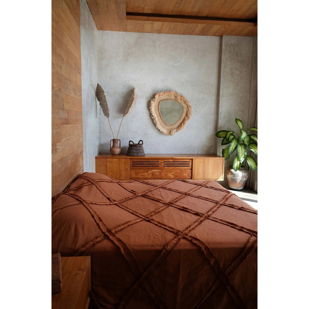 Beige round grass-framed mirror