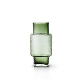 Green glass vase on a white background
