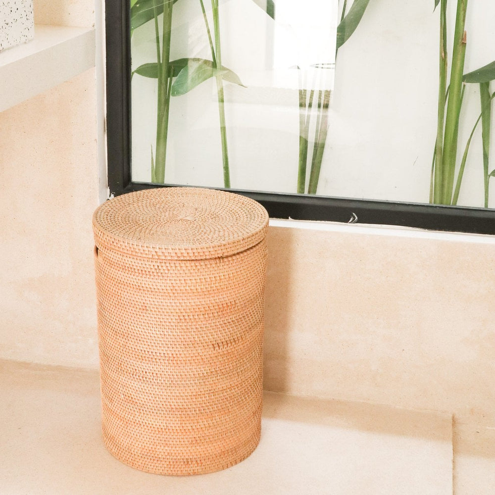 Beige woven rattan laundry basket with lid