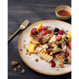 White stoneware salad plate with brown rim