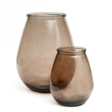 Two brown glass vases on a white background