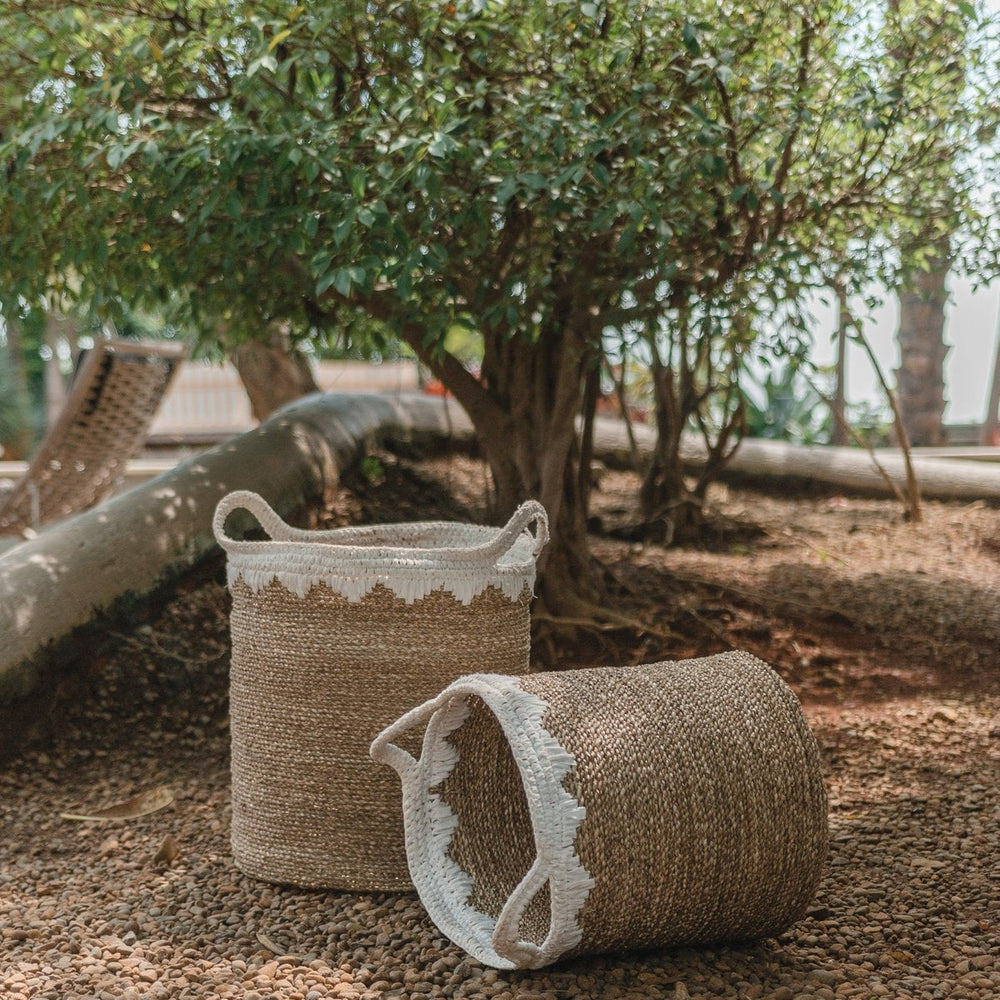 White woven seagrass storage basket with handles