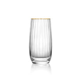 Clear glass with gold rim on a white background