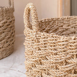 Beige woven seagrass storage basket