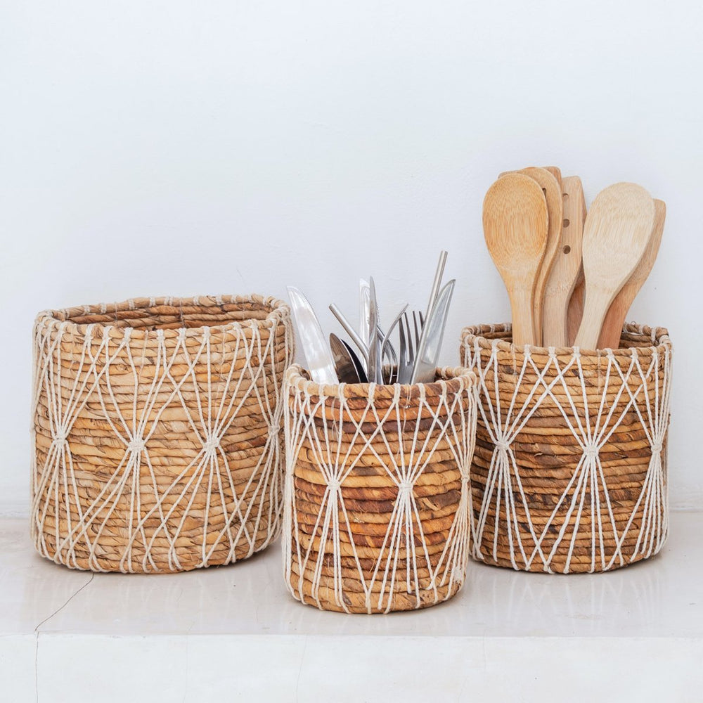 Brown and white woven banana fibre storage basket with cotton macramé lacing