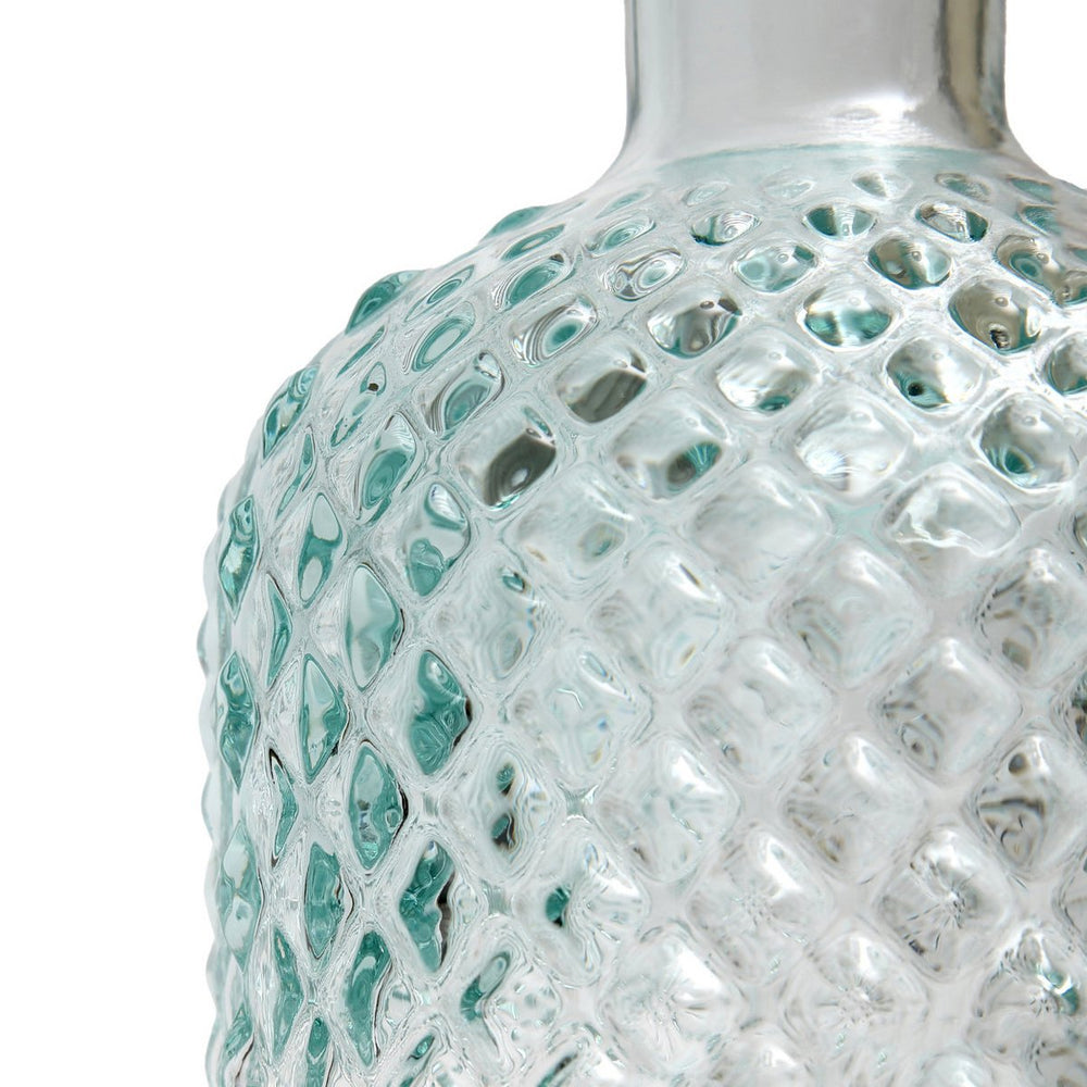 Blue handcrafted glass bottle