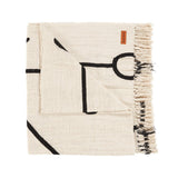 Black cotton throw with Evil Eye design