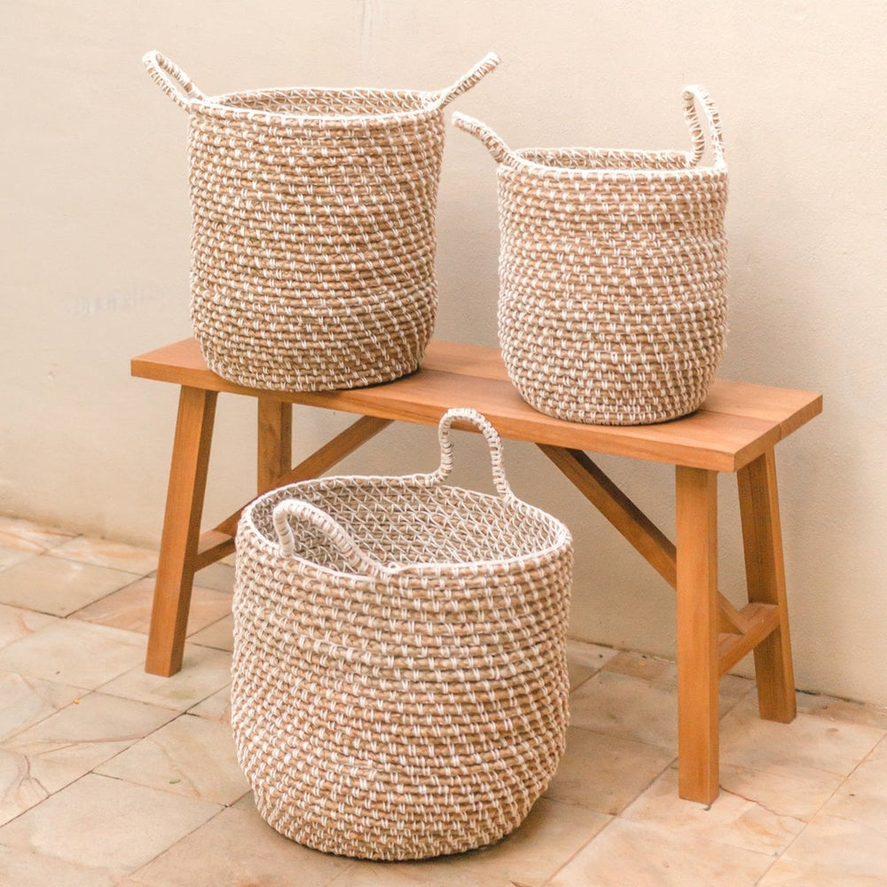 Beige woven banana fibre storage basket with white cotton cord pattern