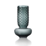 Textured glass vase on a white background