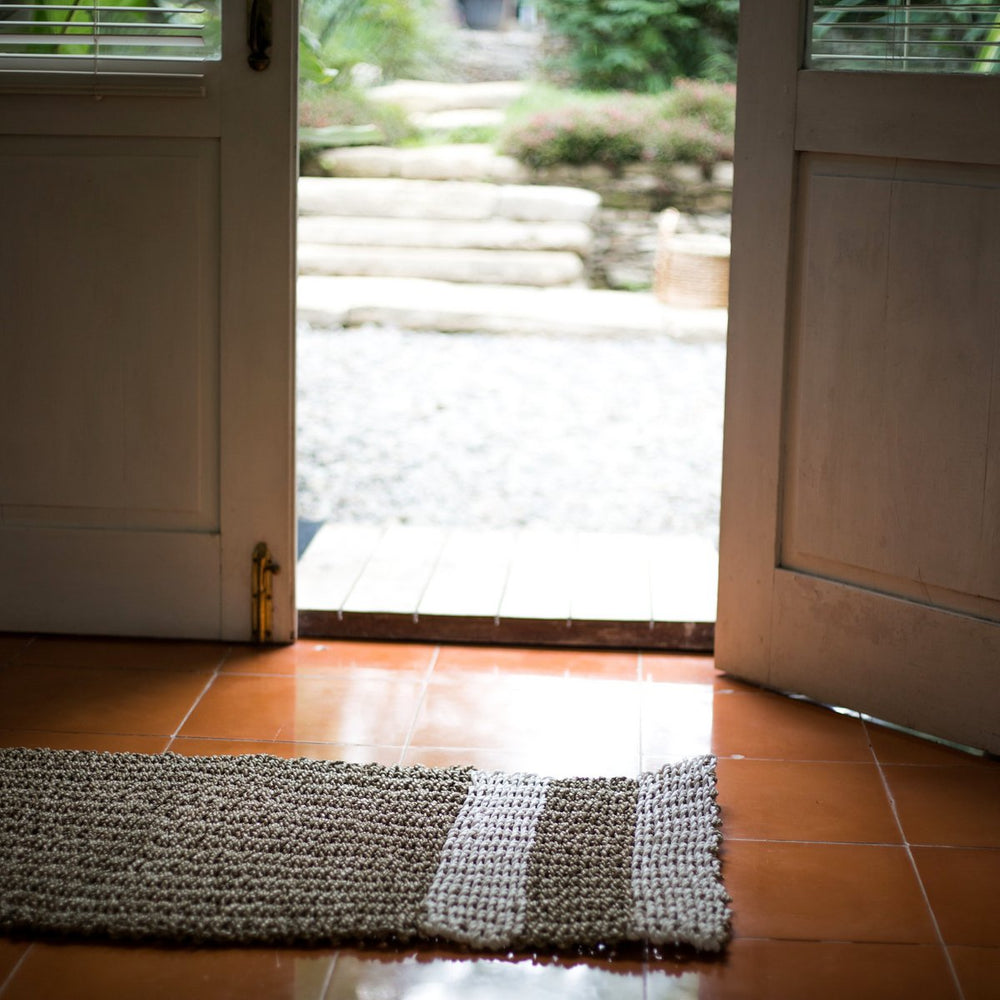 Beige and white striped seagrass rug