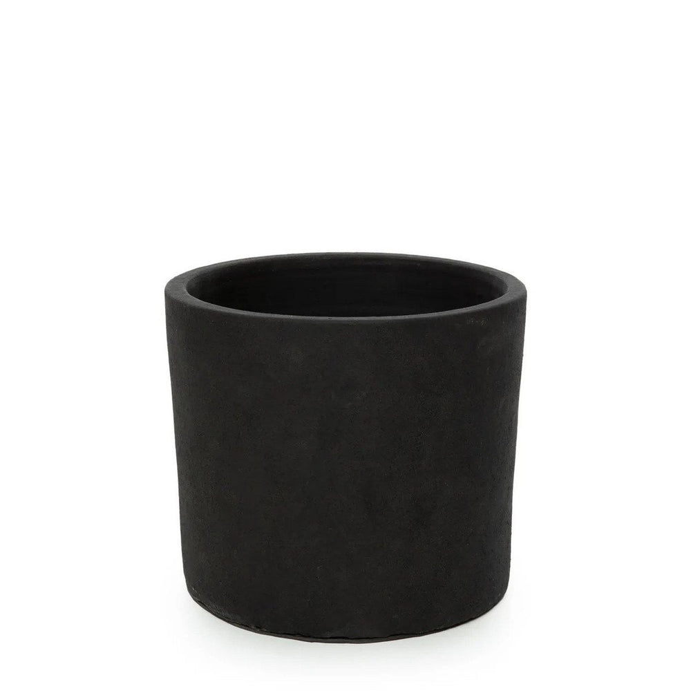 Black terracotta planter on teak branch stand