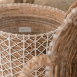 Brown banana fibre basket with white cotton woven pattern