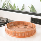 Beige round bamboo serving tray