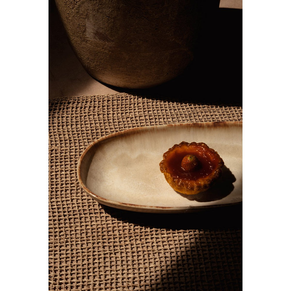 White stoneware oval plate with gold accent