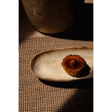 White stoneware oval plate with gold accent