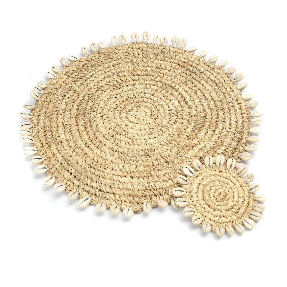 Natural raffia placemat with cowrie shells