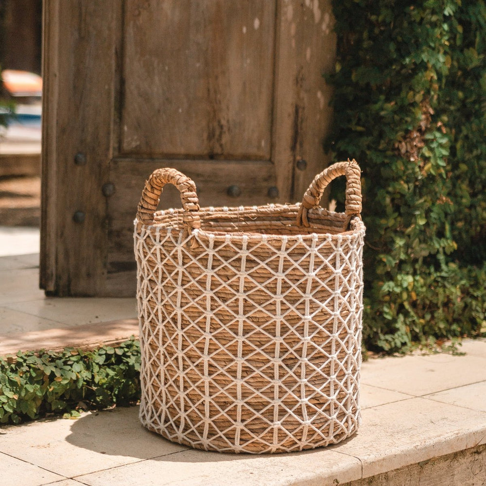 Brown banana fibre basket with white cotton woven pattern
