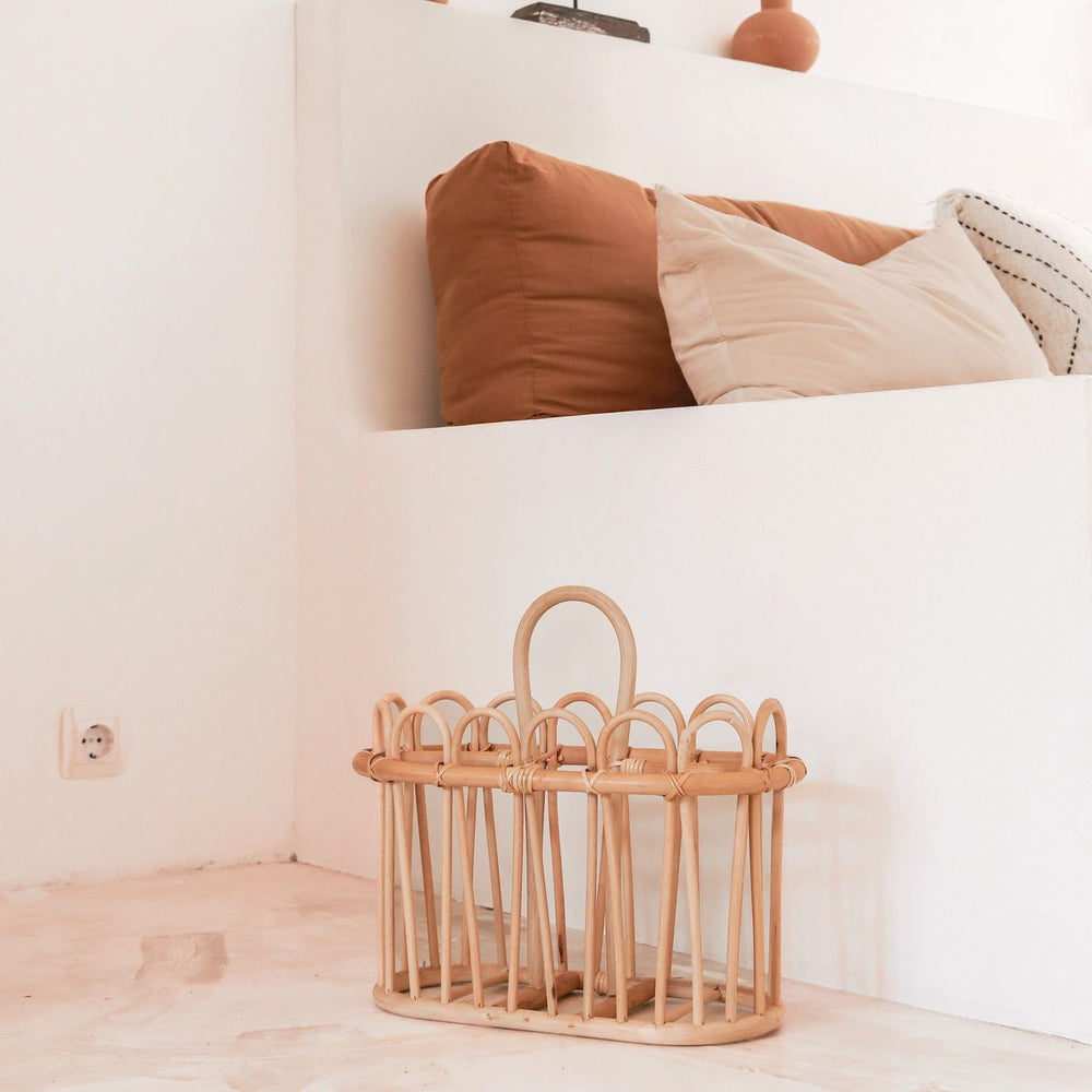 Beige rattan newspaper basket with two compartments