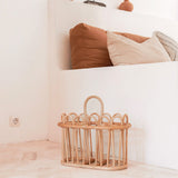Beige rattan newspaper basket with two compartments