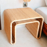 Beige rattan side table with metal frame