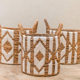 Brown banana fibre basket with white cotton macrame pattern
