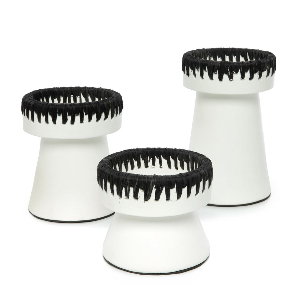 White and black terracotta candle holder with raffia trim