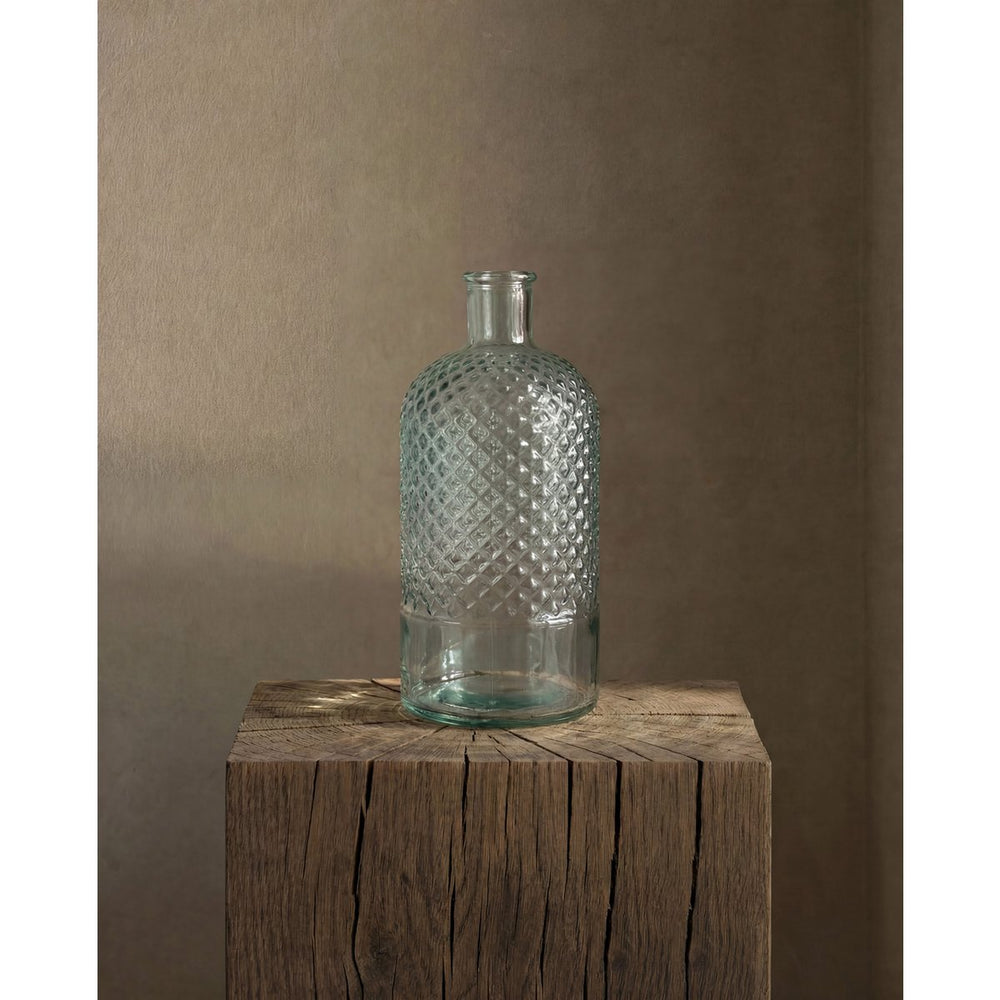 Blue handcrafted glass bottle