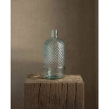 Blue handcrafted glass bottle