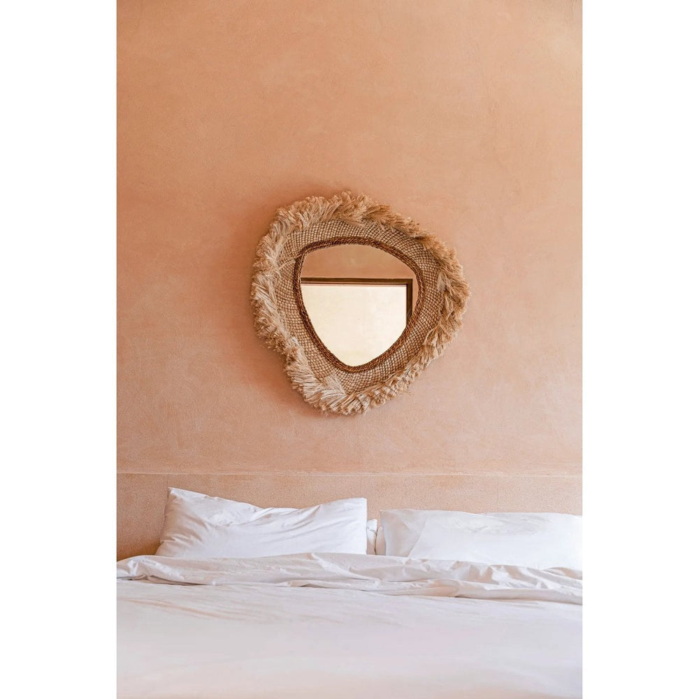 Beige round grass-framed mirror