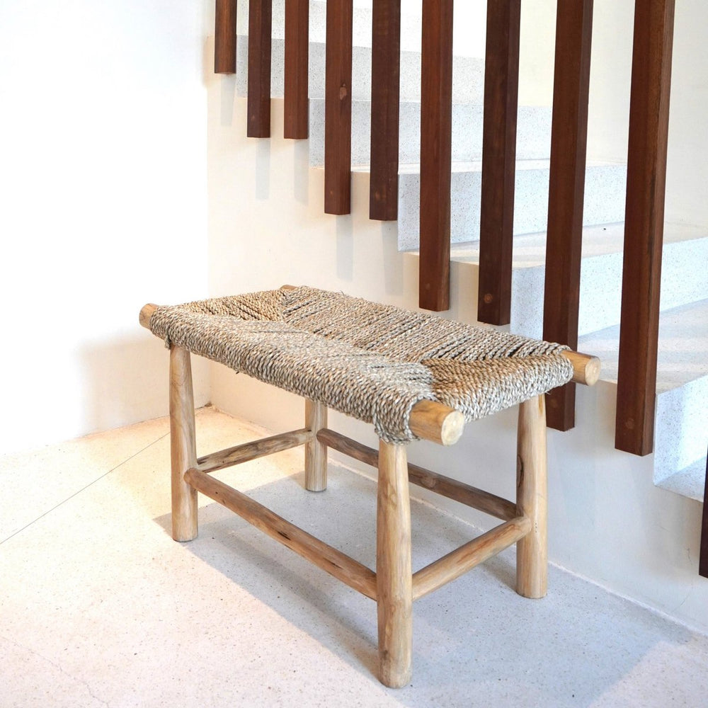 Beige wood bench with woven seagrass seat