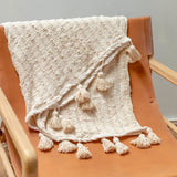 Beige handwoven cotton blanket with striped weave