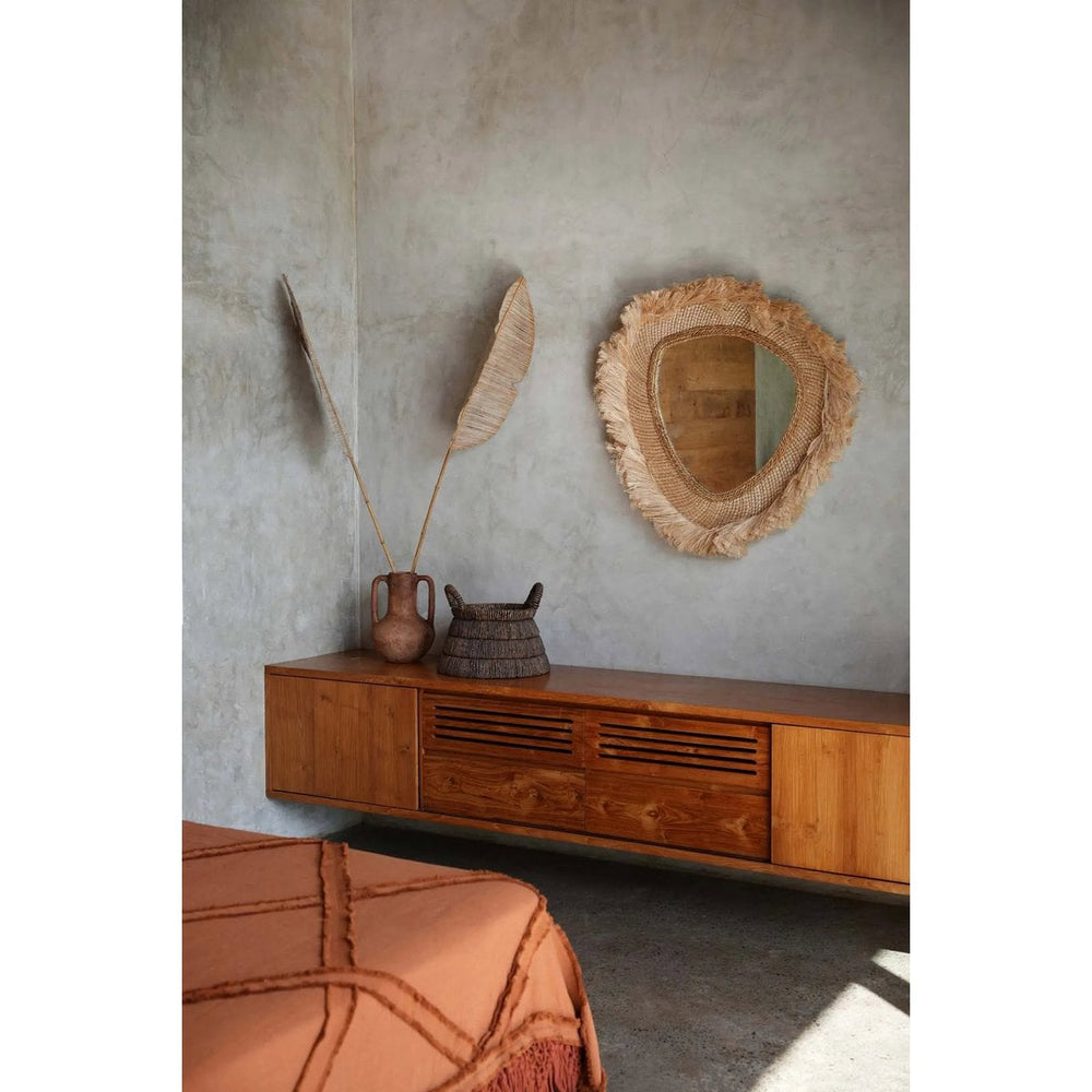 Beige round grass-framed mirror