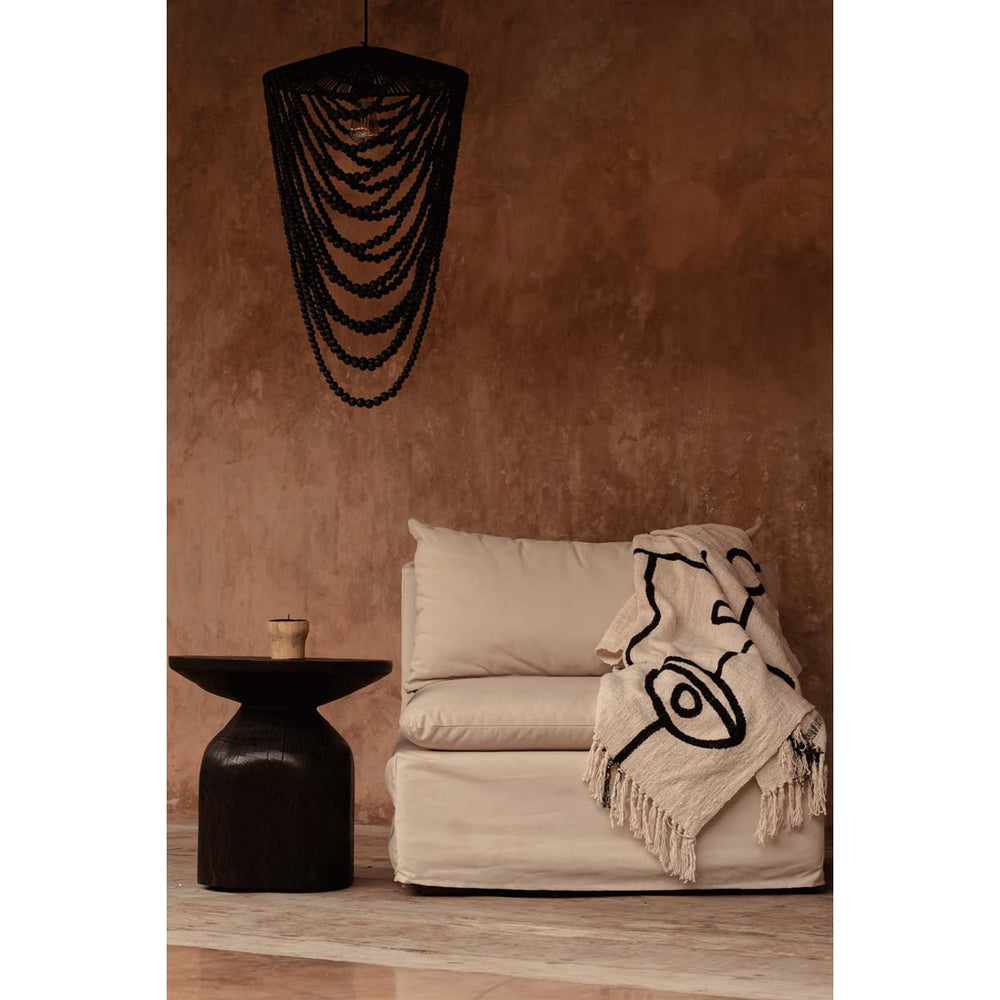Black cotton throw with Evil Eye design