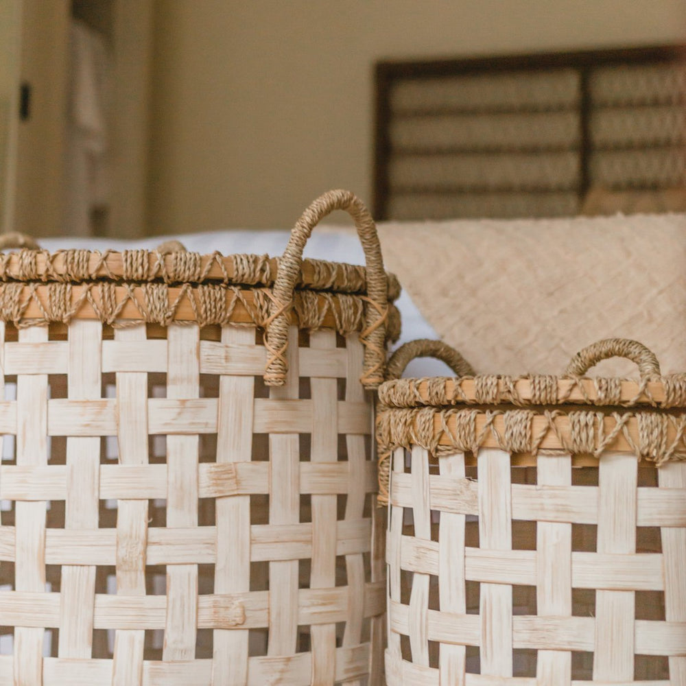 White woven bamboo laundry basket with seagrass lid